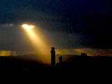 squarcio nel cielo e raggio di luce